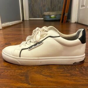 DKNY black and white sneakers.